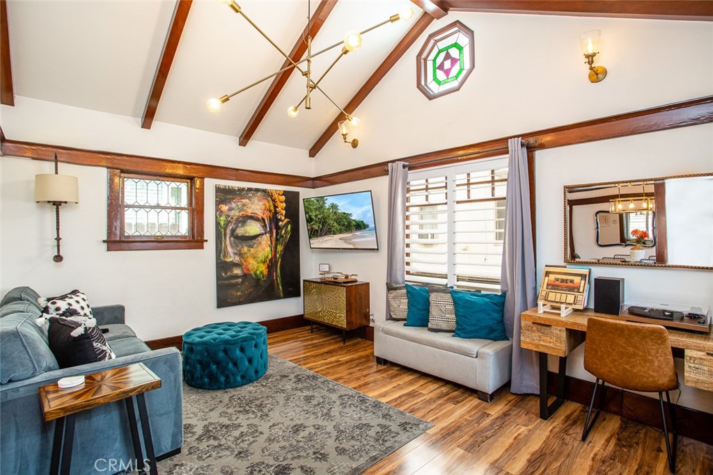 a living room with furniture and a window