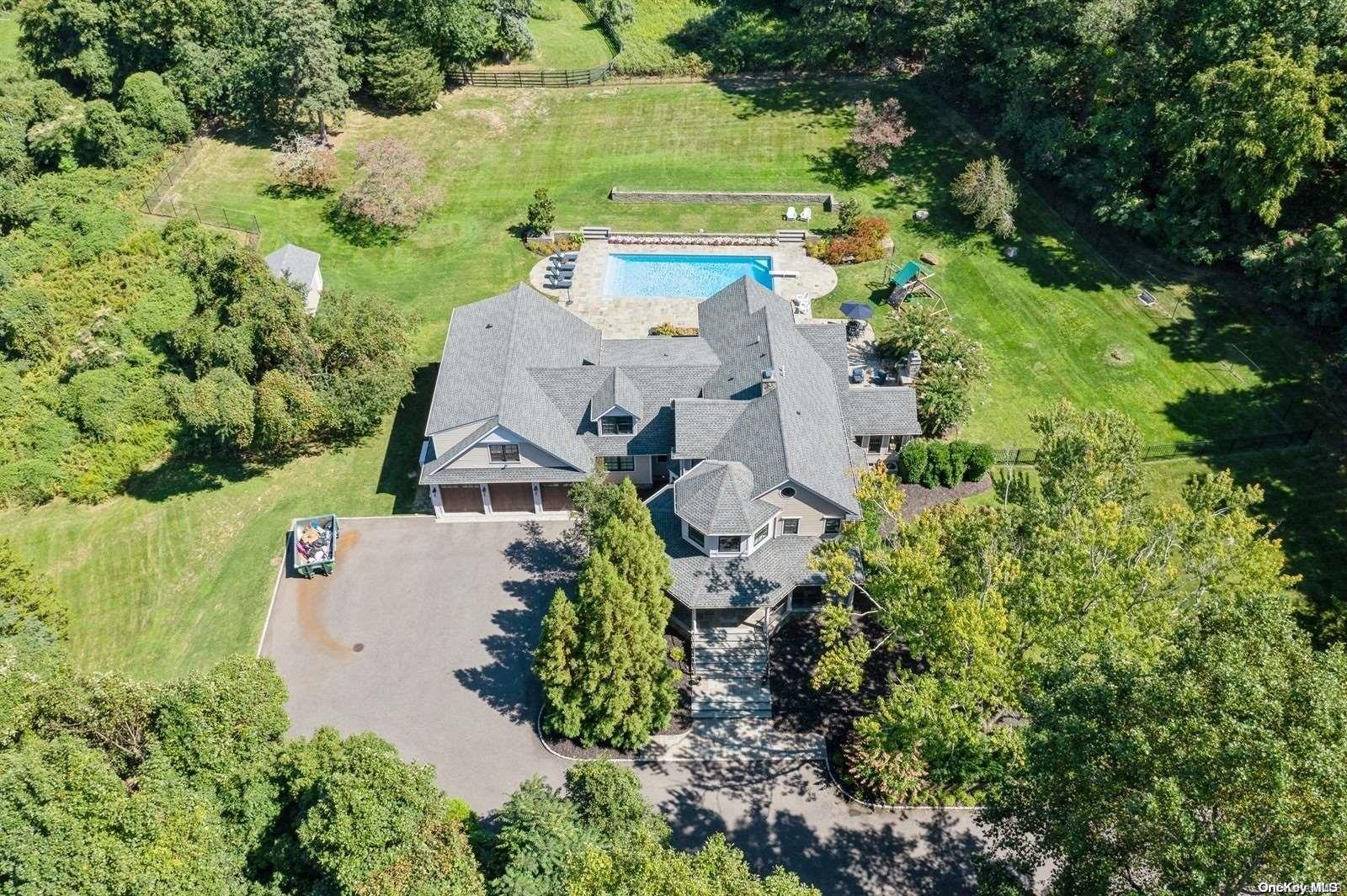 an aerial view of a house with a garden