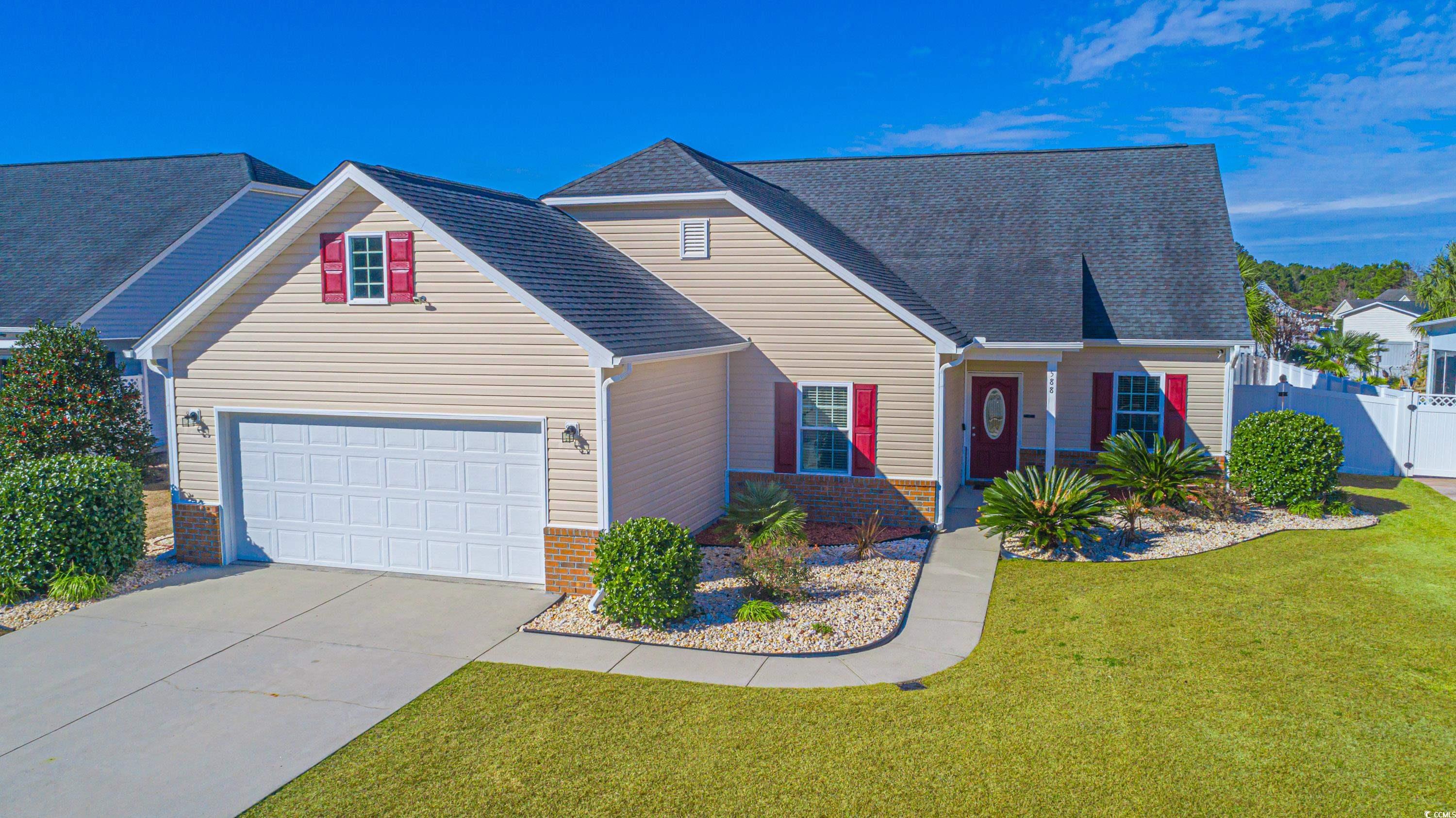 View of front of house featuring a front yard and