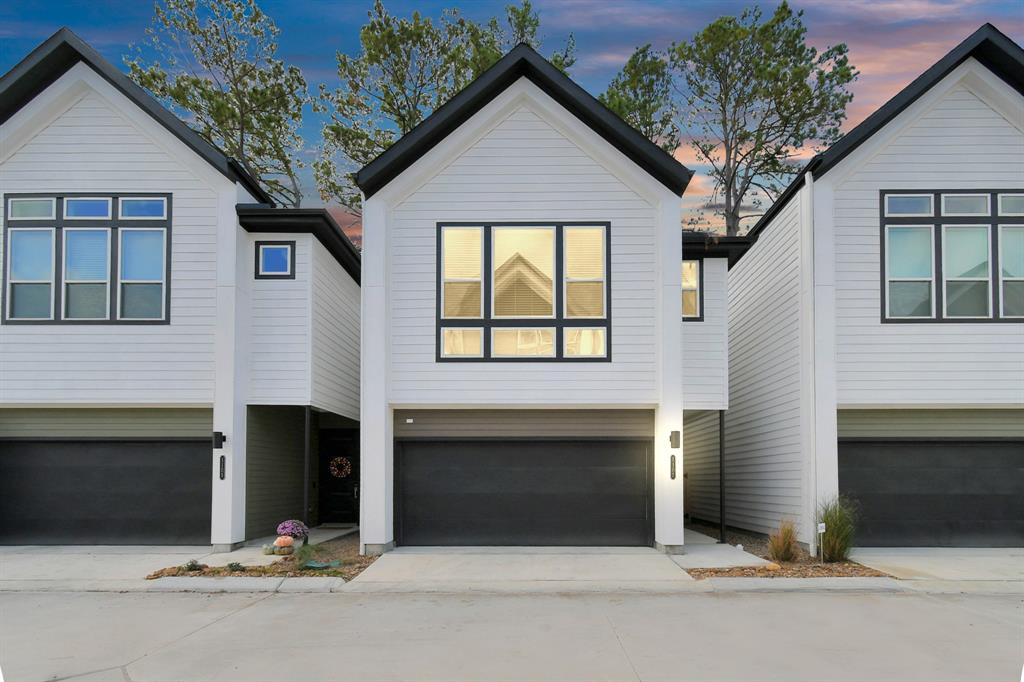 a front view of a house with yard