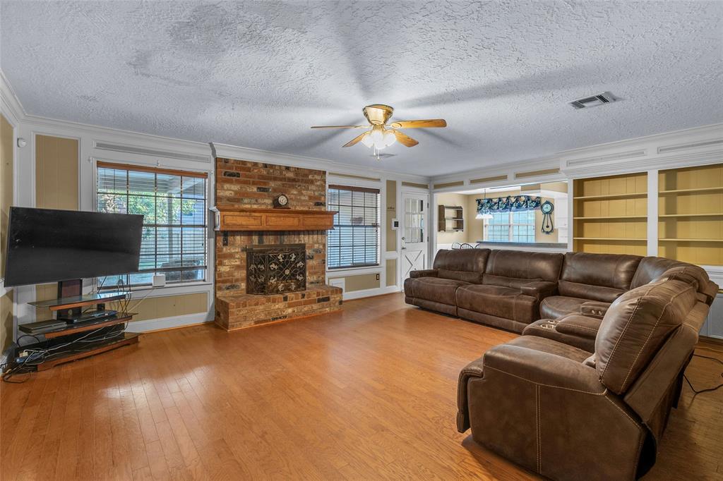 Beautiful and comfy size living area with built in cabinets