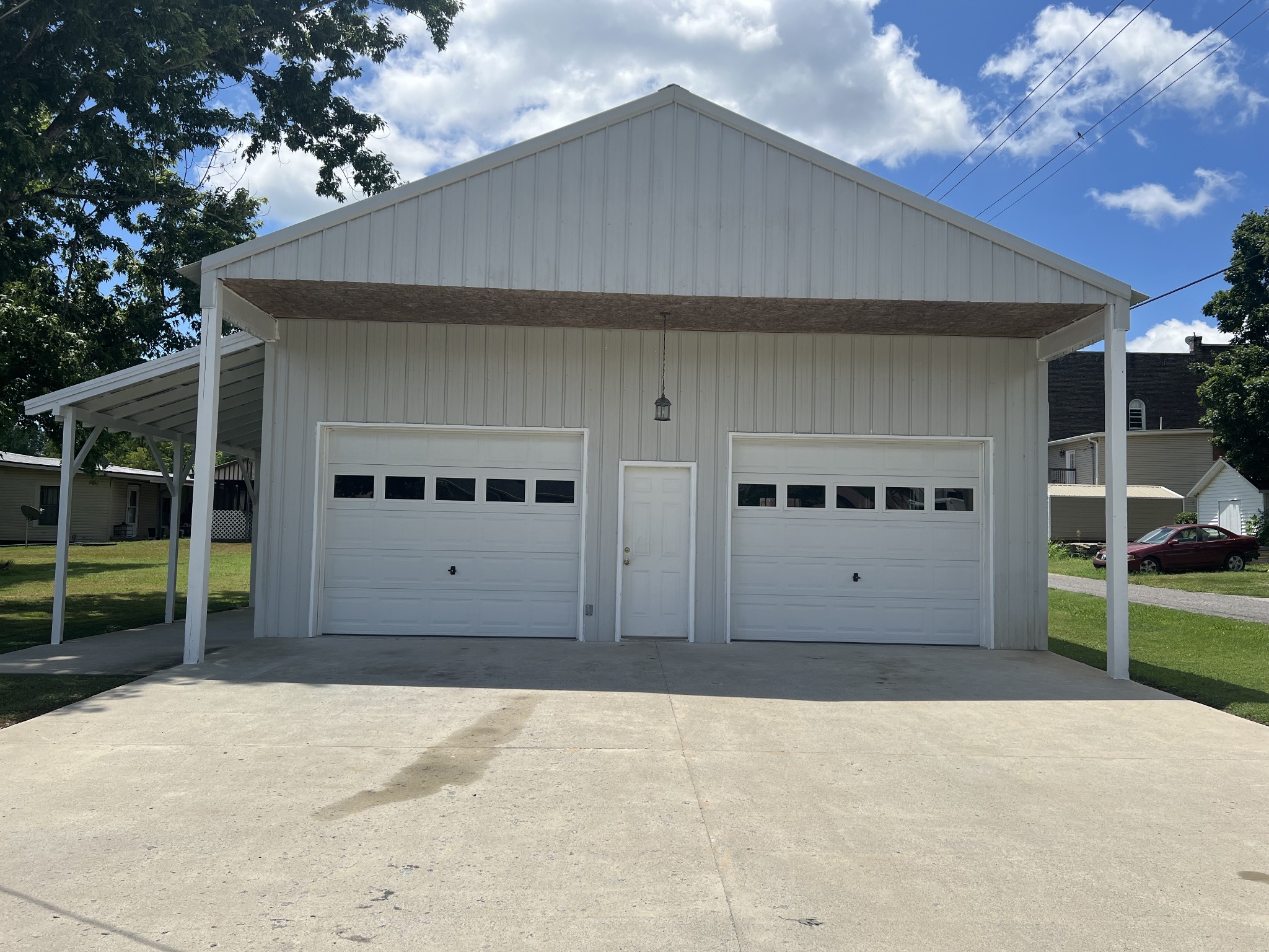 a front view of a house with garage