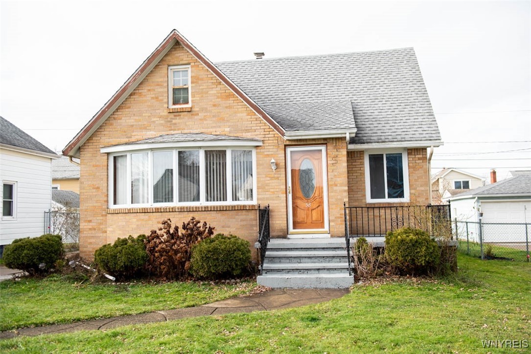 ATTRACTIVE BRICK AND VINYL EXTERIOR ON MAIN HOUSE