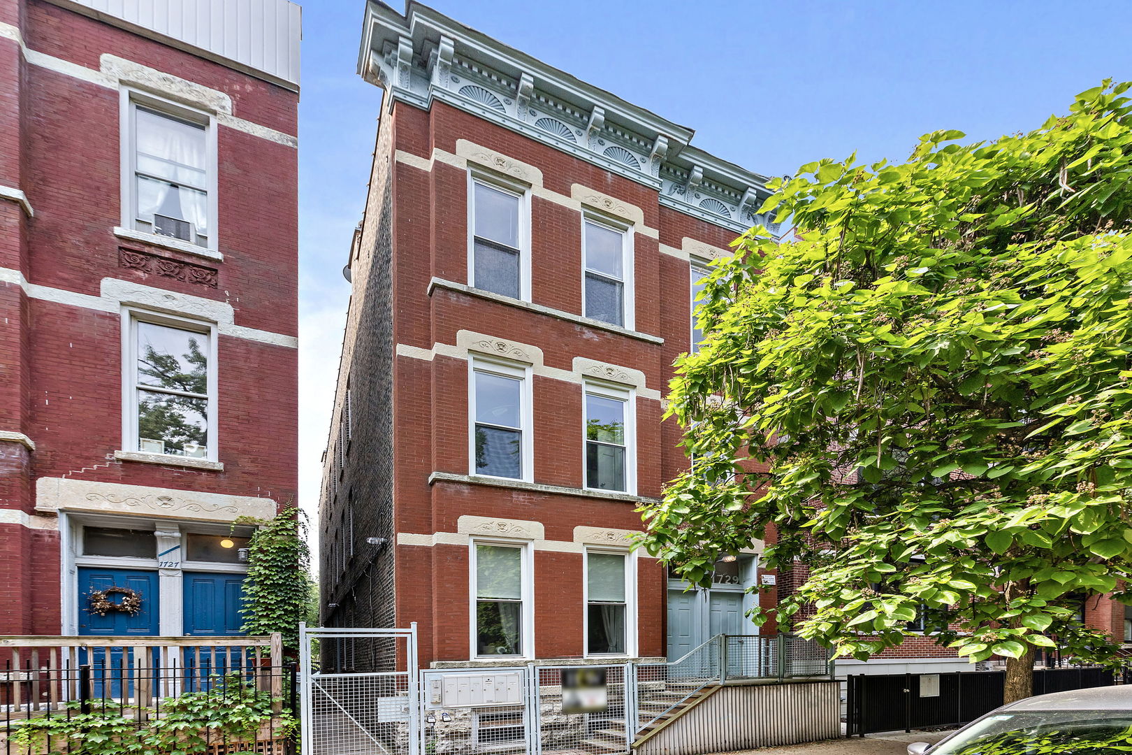 a front view of a multi story residential apartment building