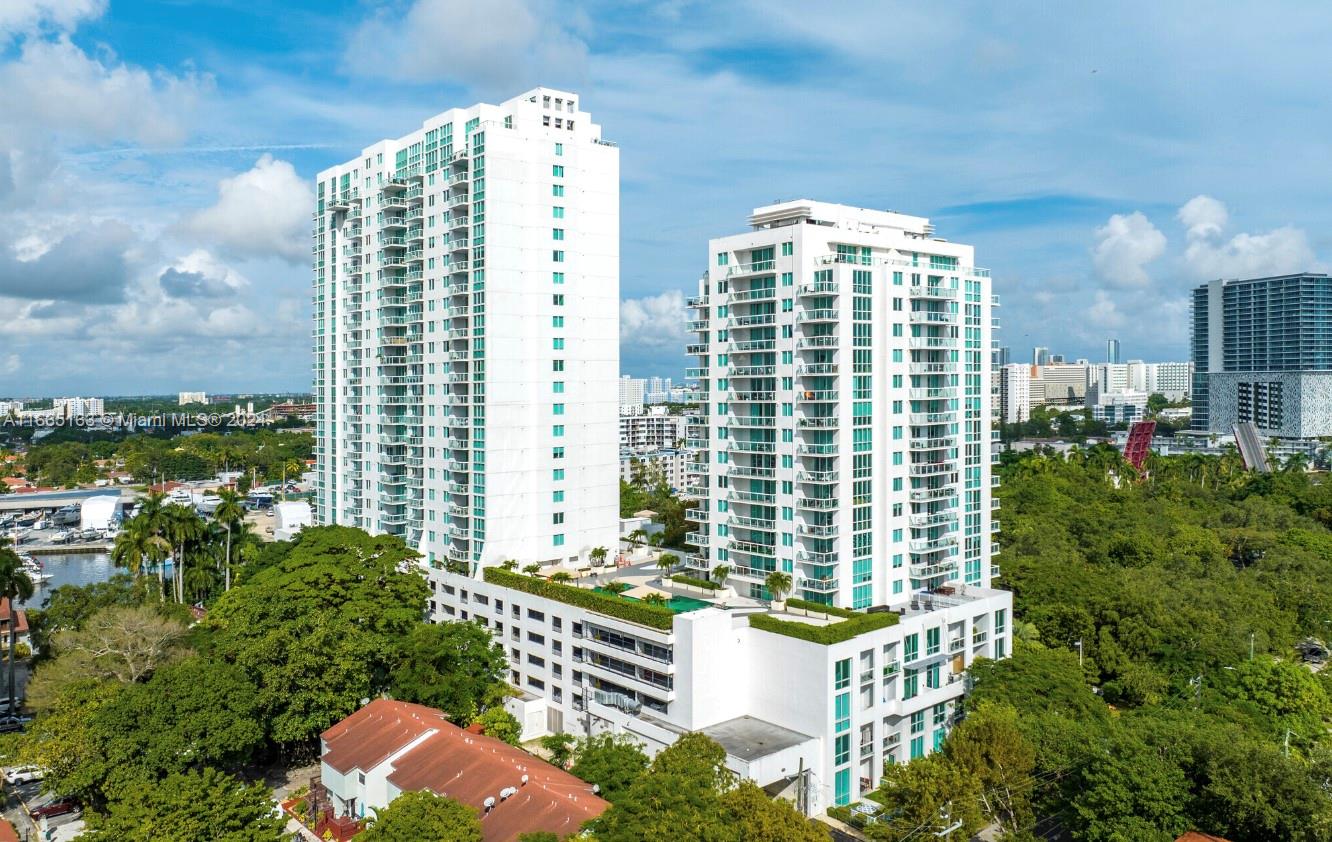 a view of a city with tall buildings