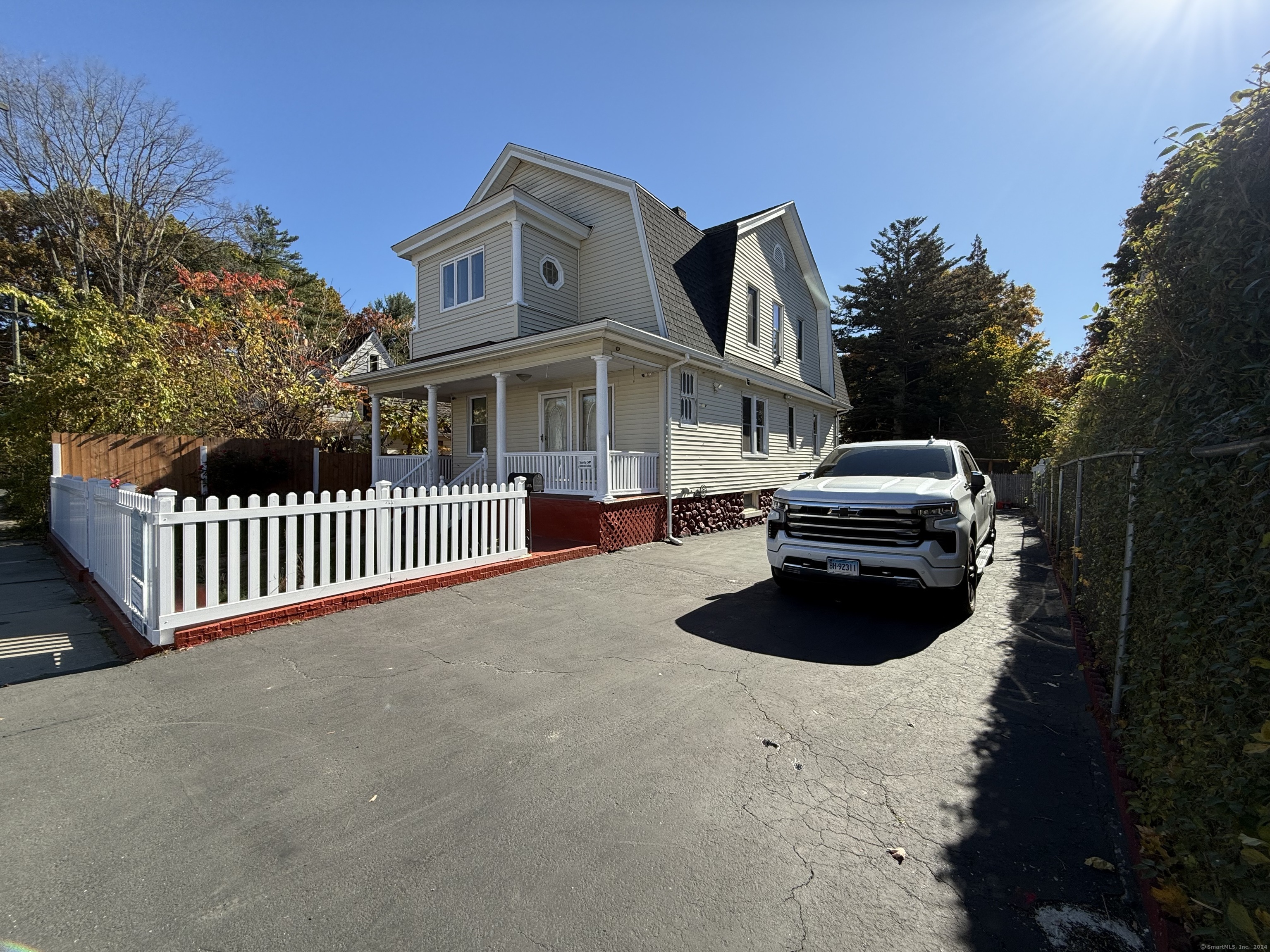 a house view with a garden space