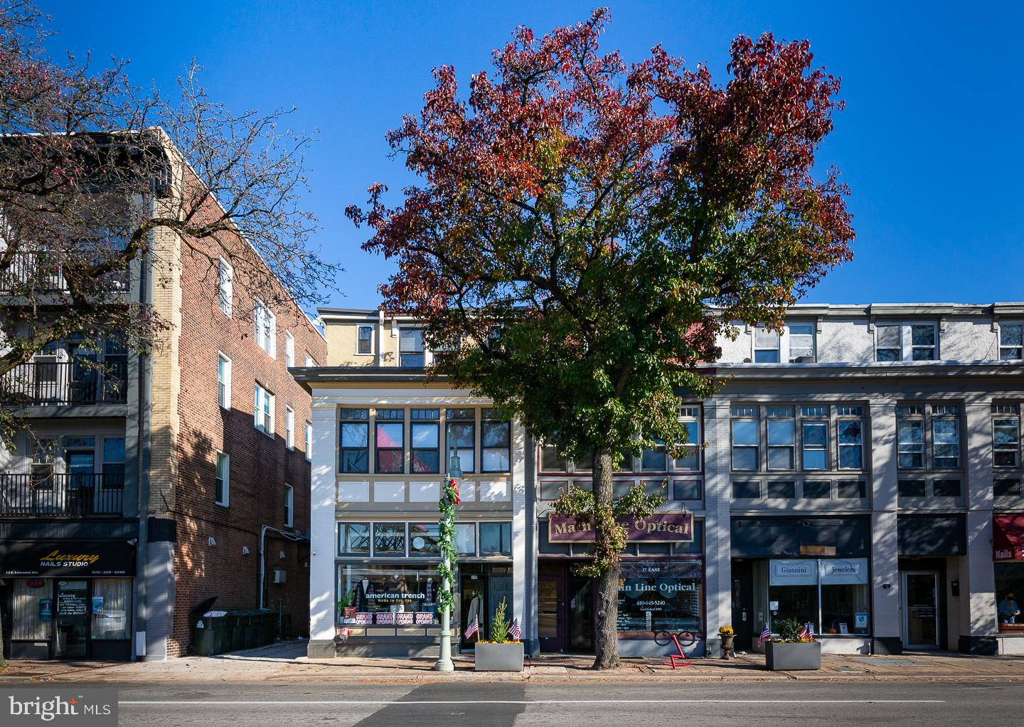 a view of a building and a street