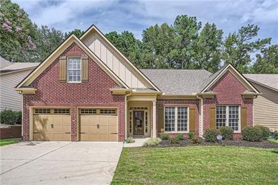 front view of a house with a yard