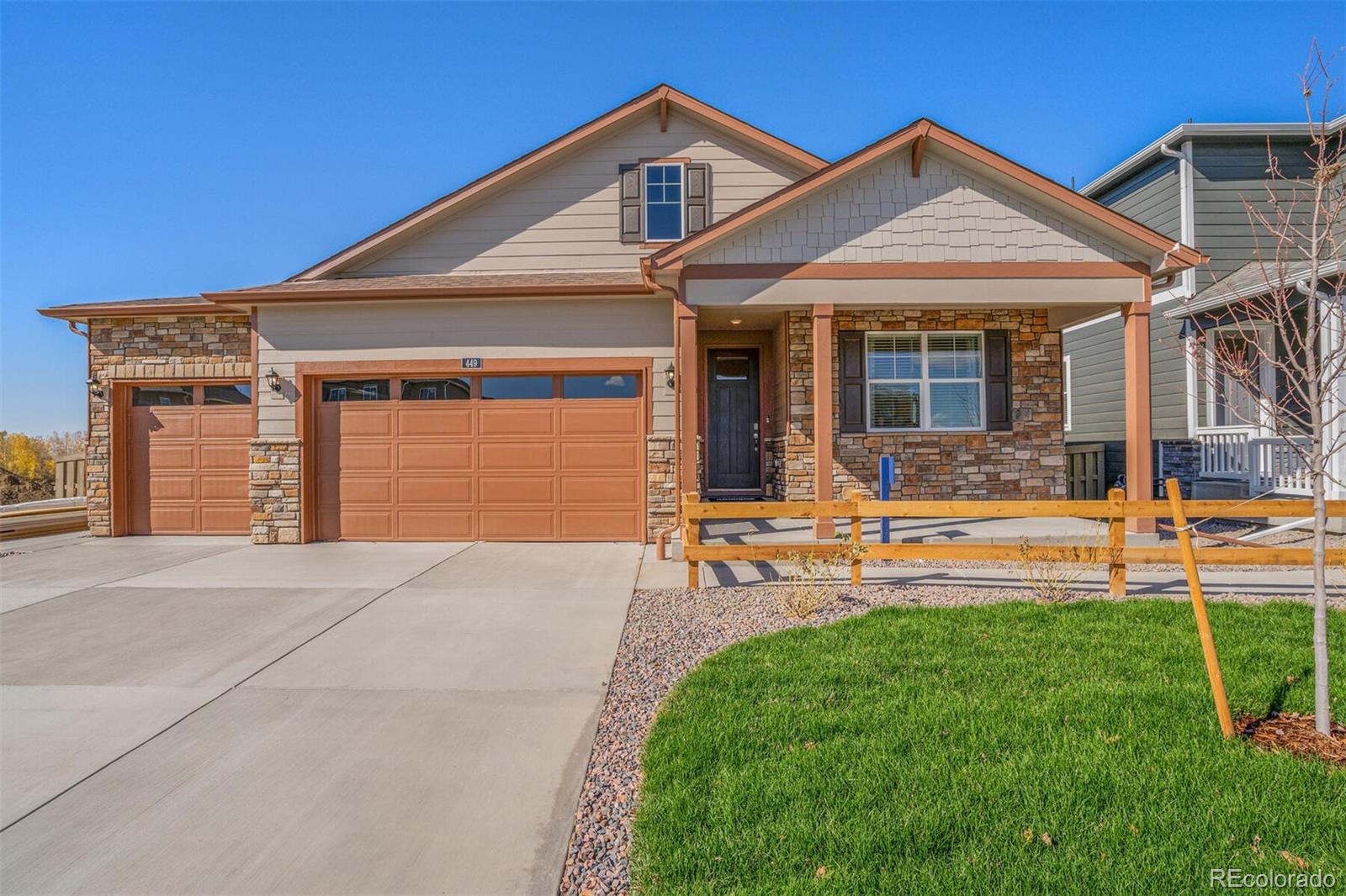 a front view of a house with patio