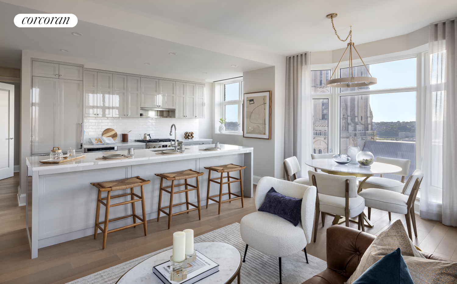 a kitchen with a dining table chairs and white cabinets