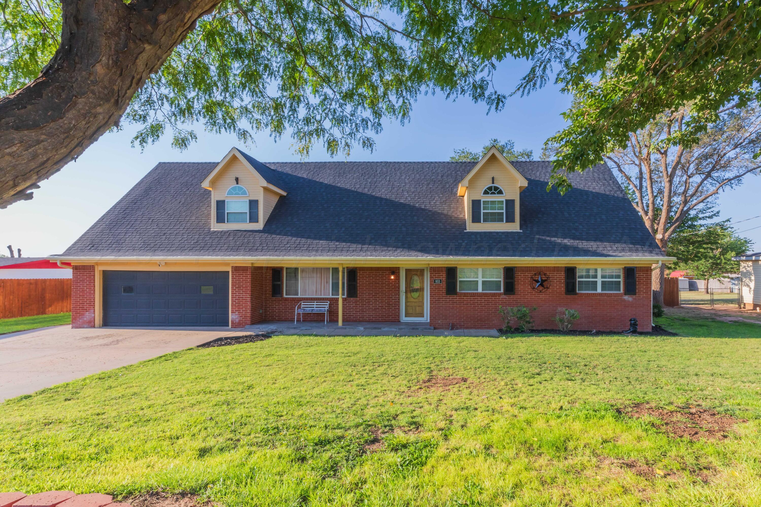 front view of house with a yard