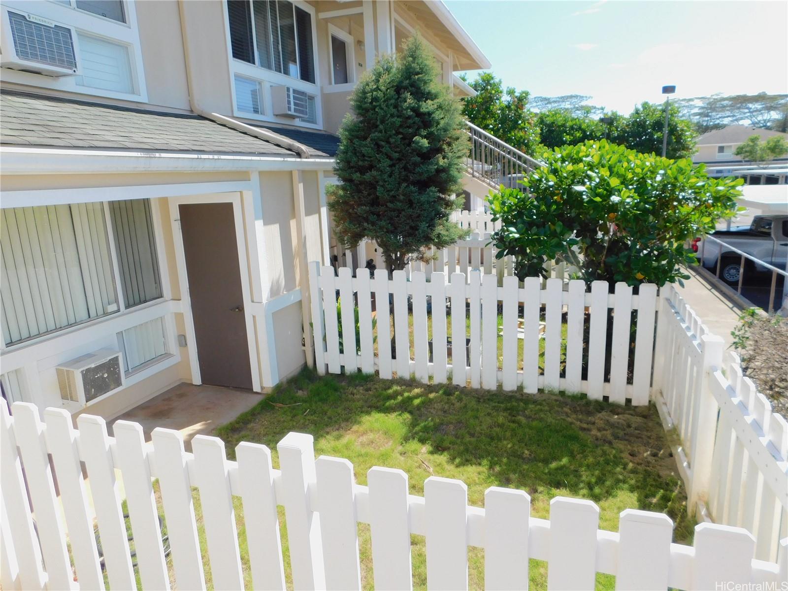 Rarely available GROUND FLOOR townhome with FRONT AND BACK COURTYARDS.  Exterior storage closet.