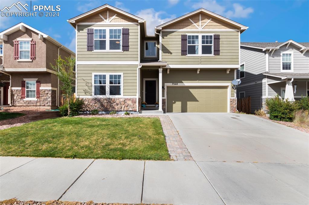 View of front of home, 2 car garage