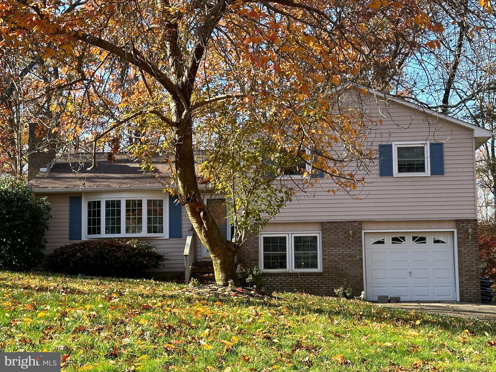 a front view of house with yard