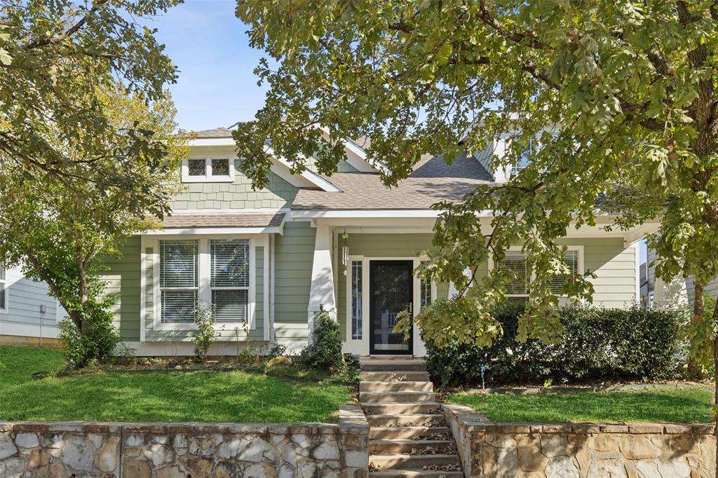 front view of a house with a garden