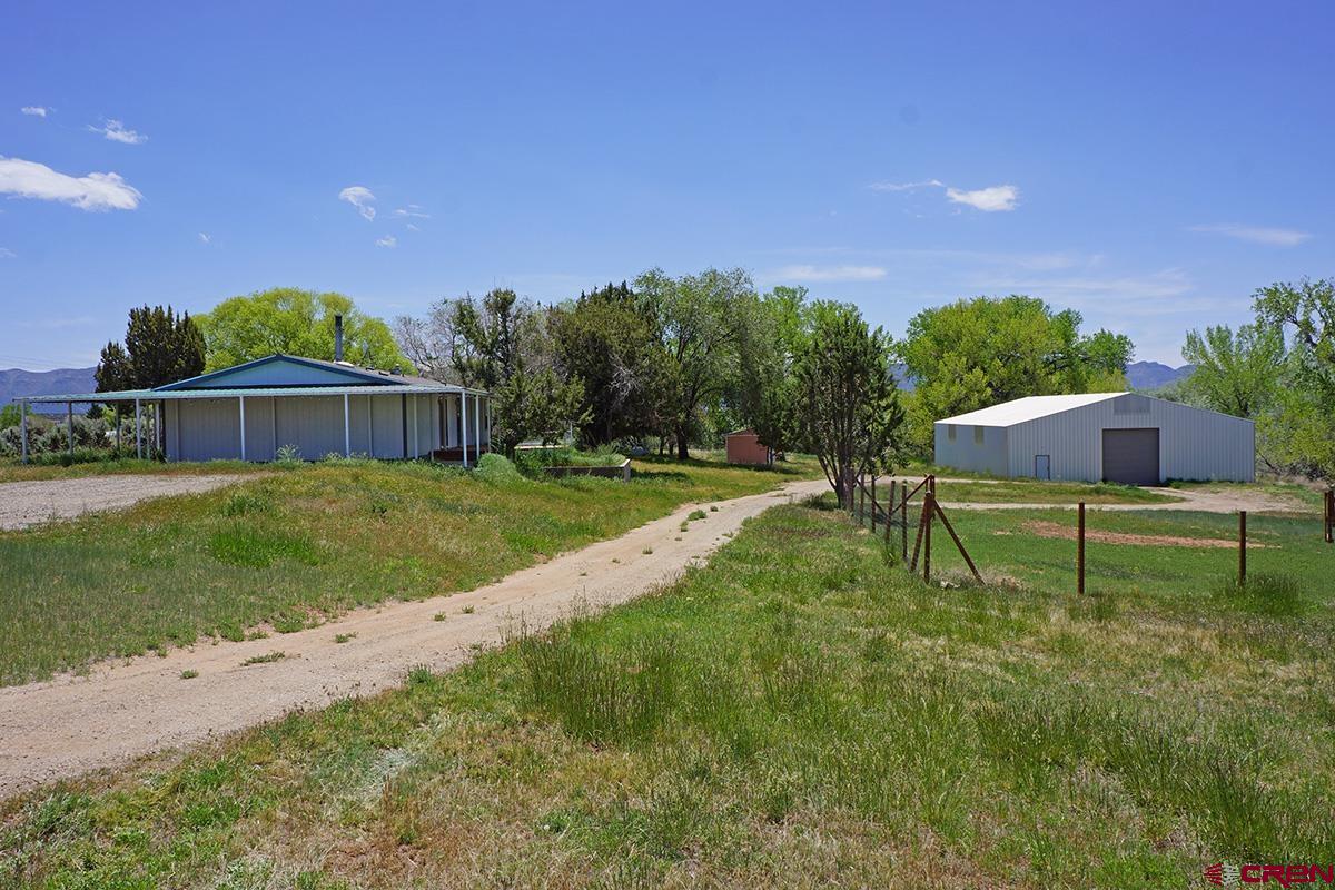 a house view with a garden space