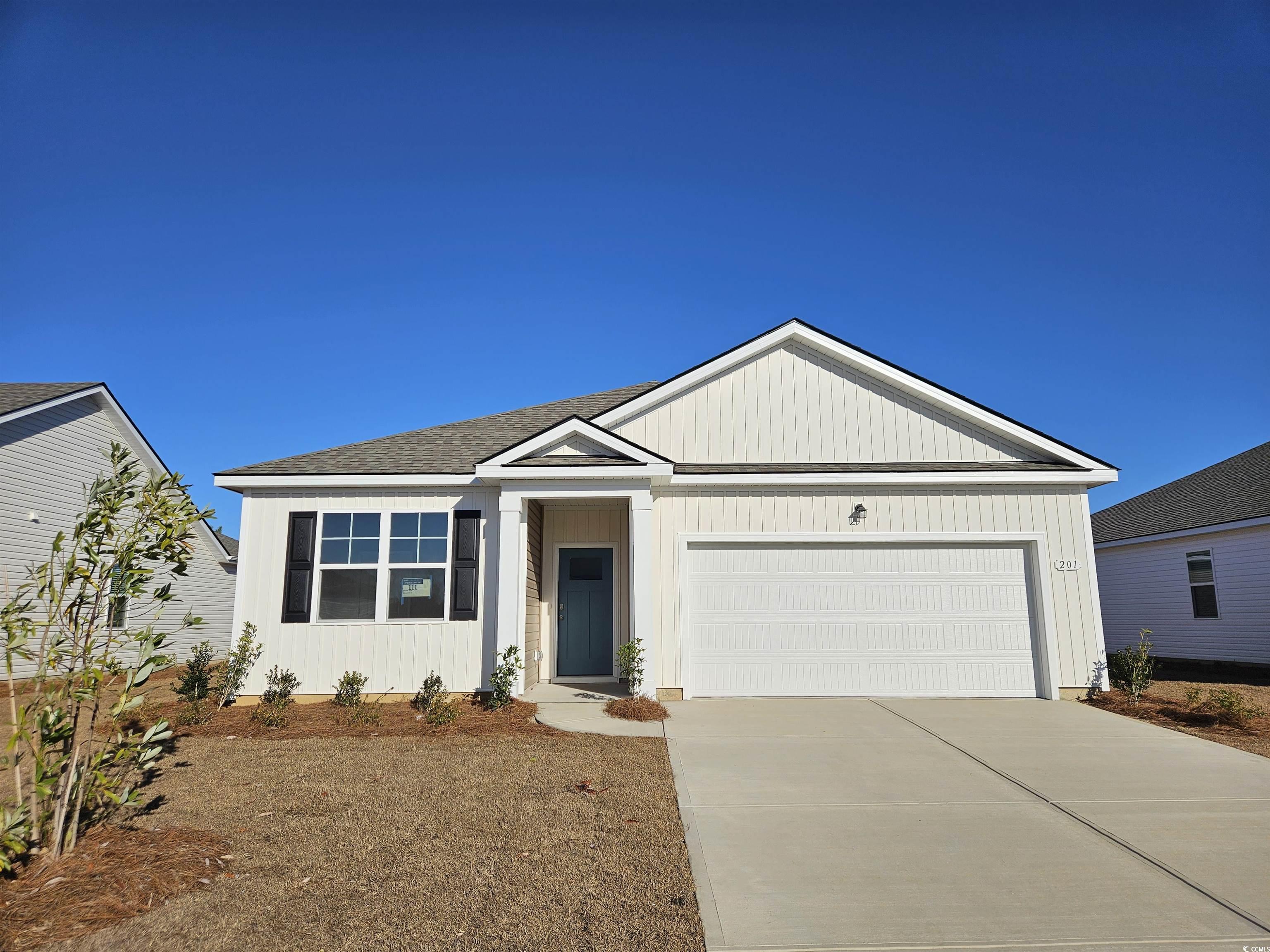 Ranch-style home with a garage