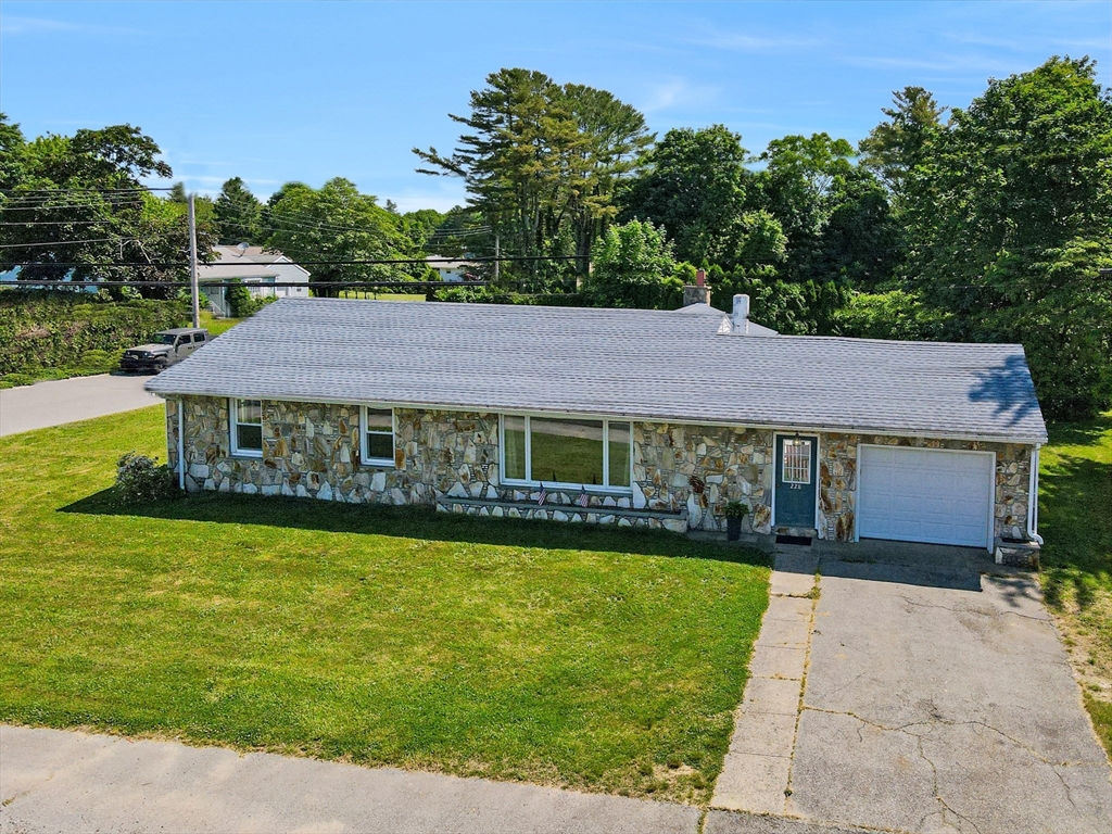 a view of a house with a garden