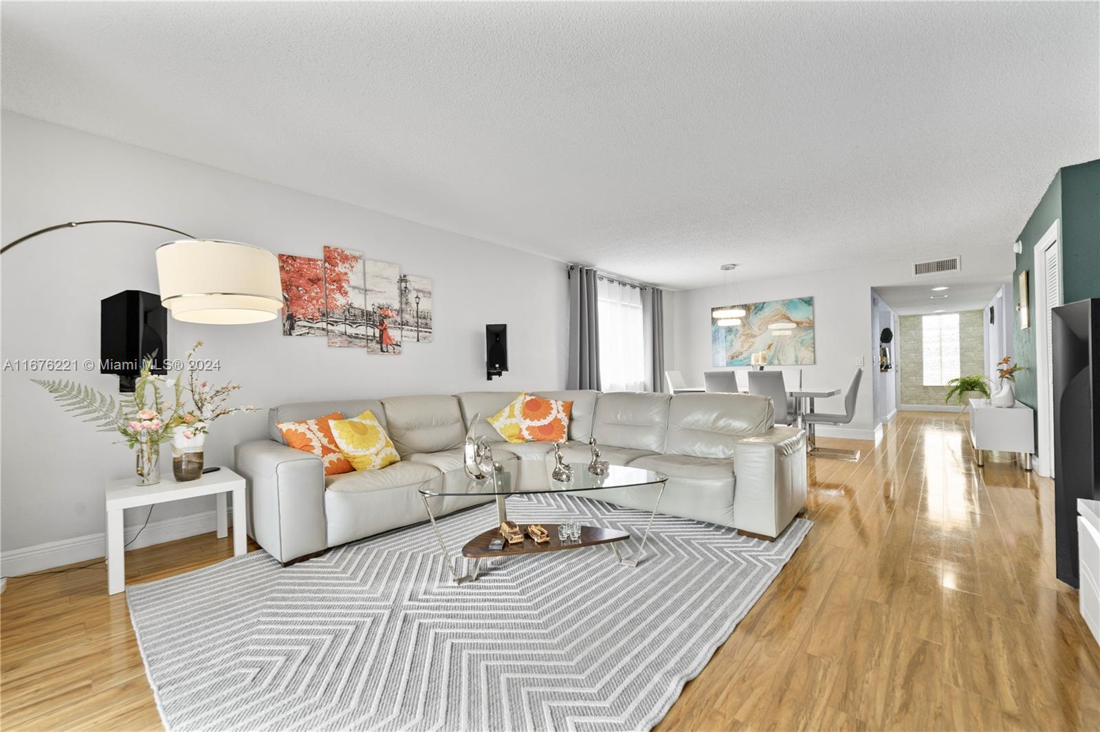 a living room with furniture and a table