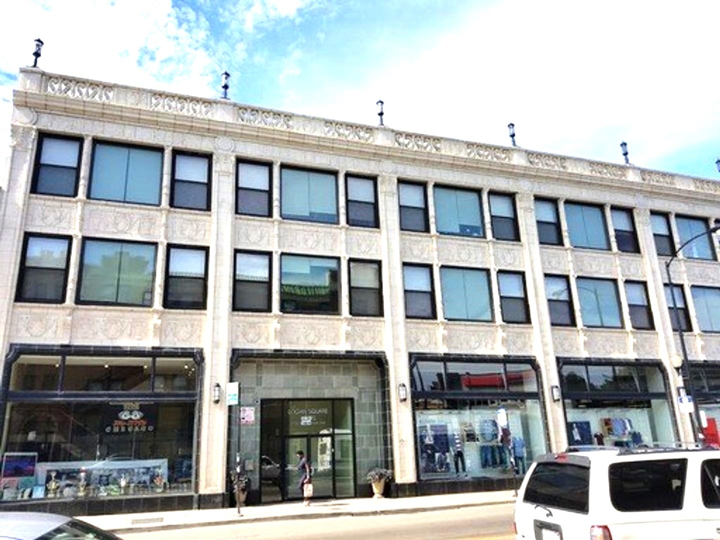 a view of a building with a street