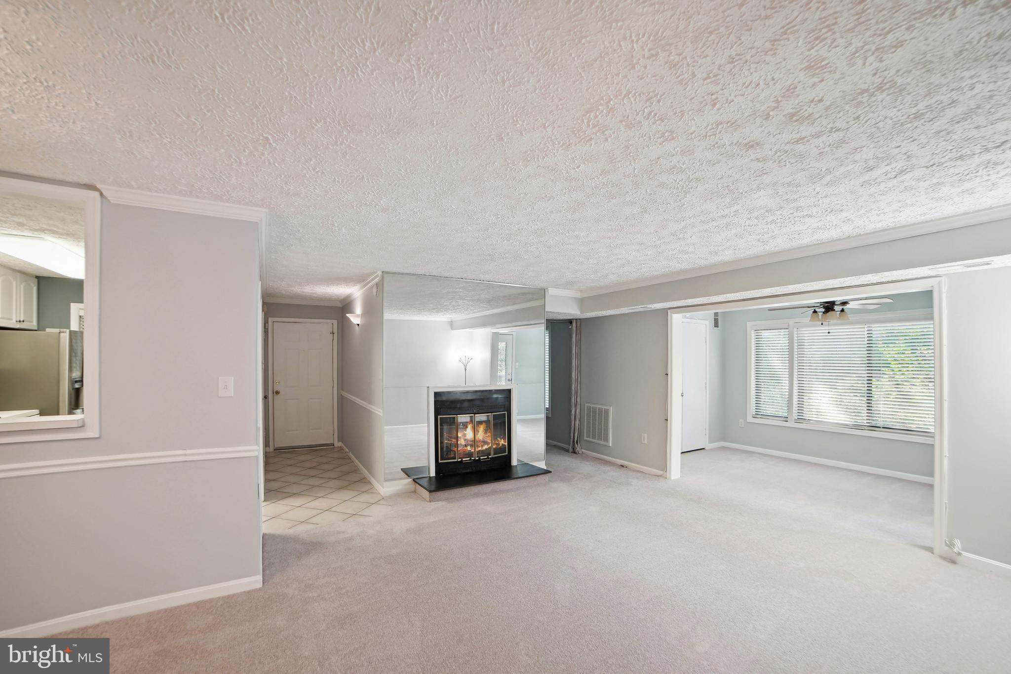 a view of a livingroom with a fireplace