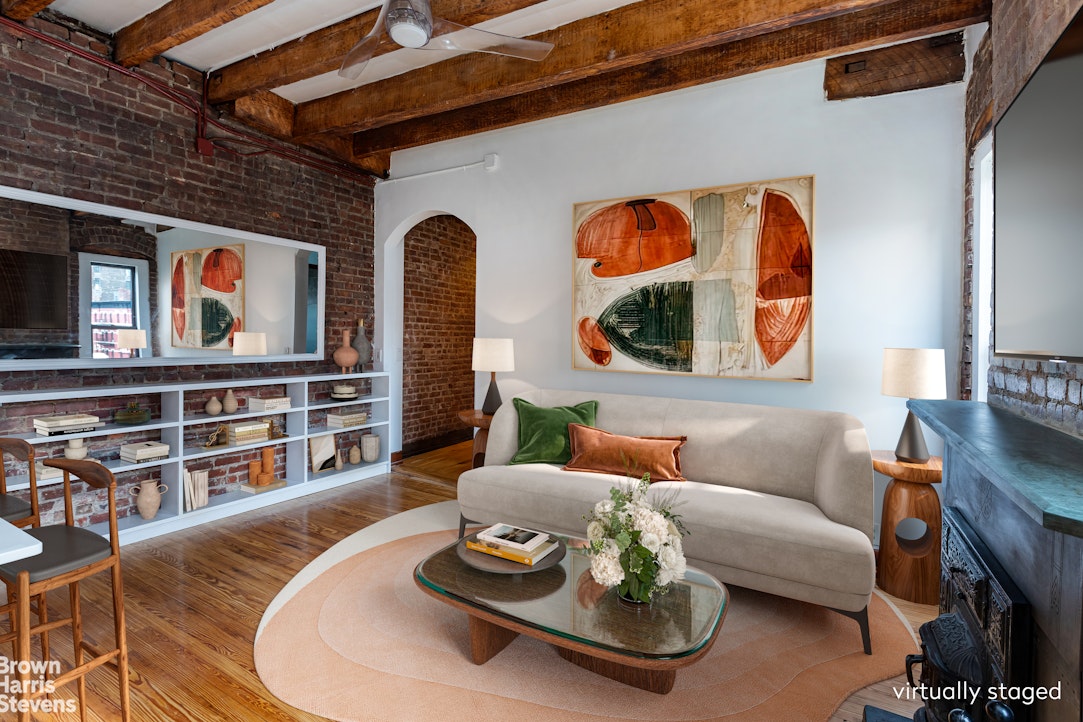 a living room with furniture and window