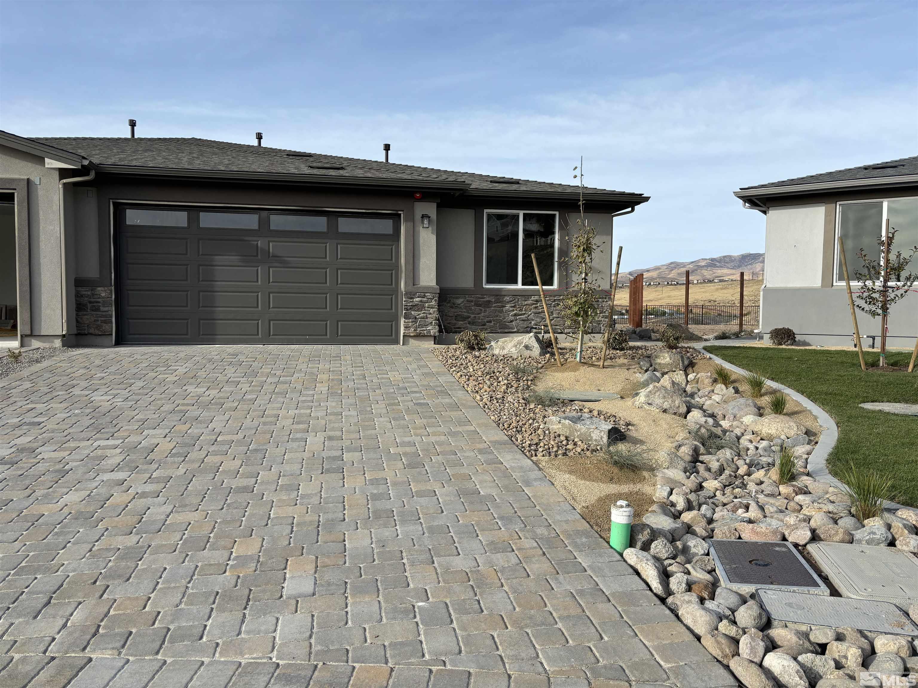 a view of a house with a patio