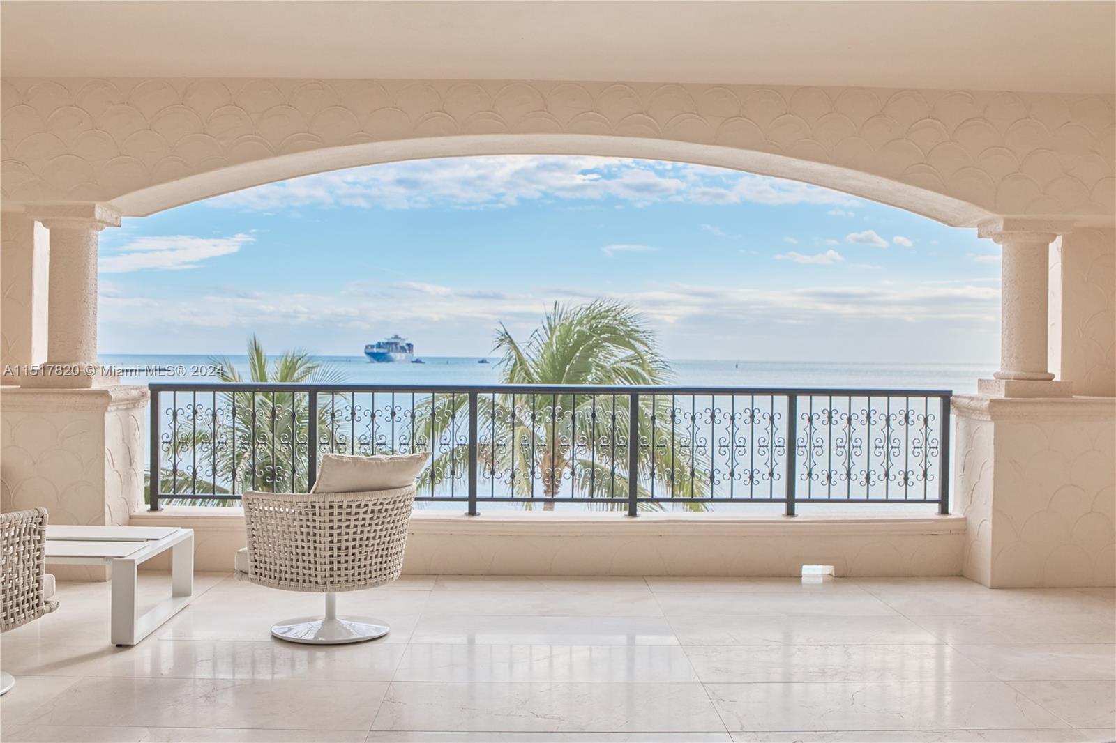 a view of roof deck with furniture