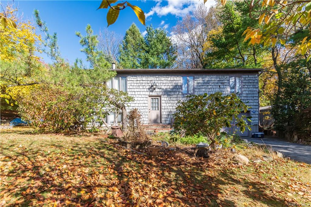 View of front of property with a garage