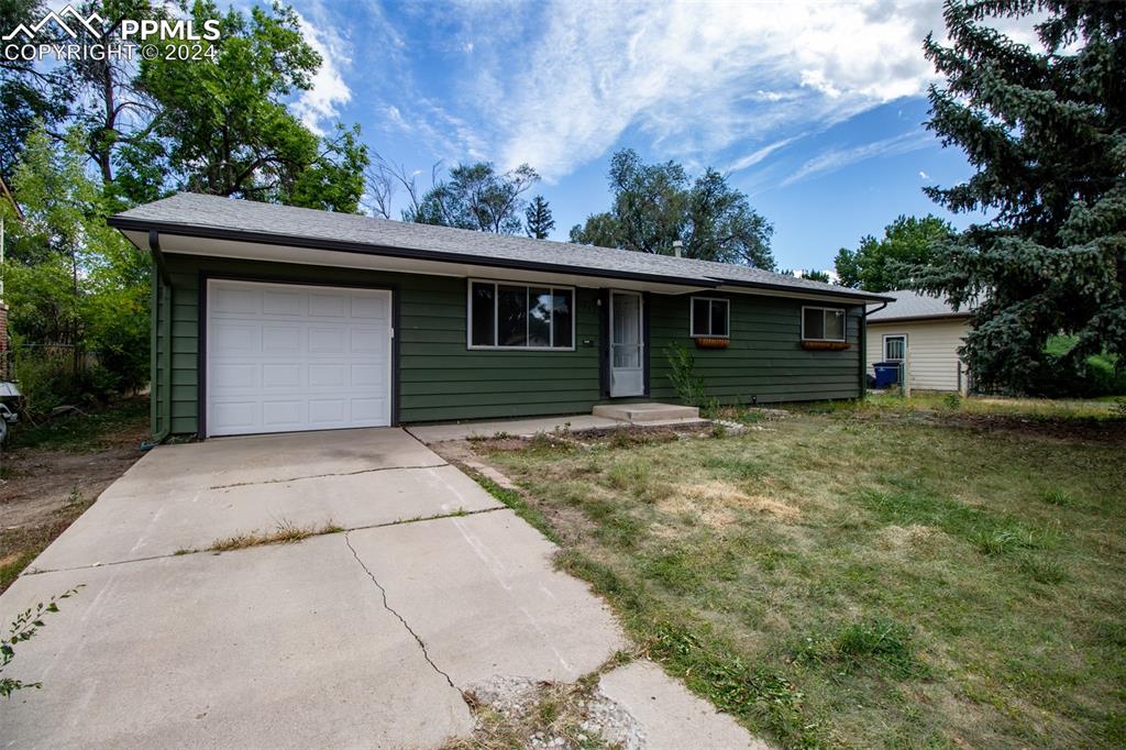 a house with trees in the background