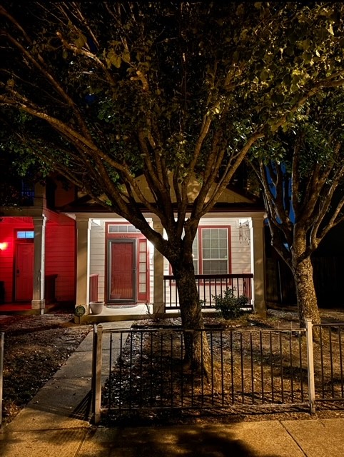 a front view of a house with parking area