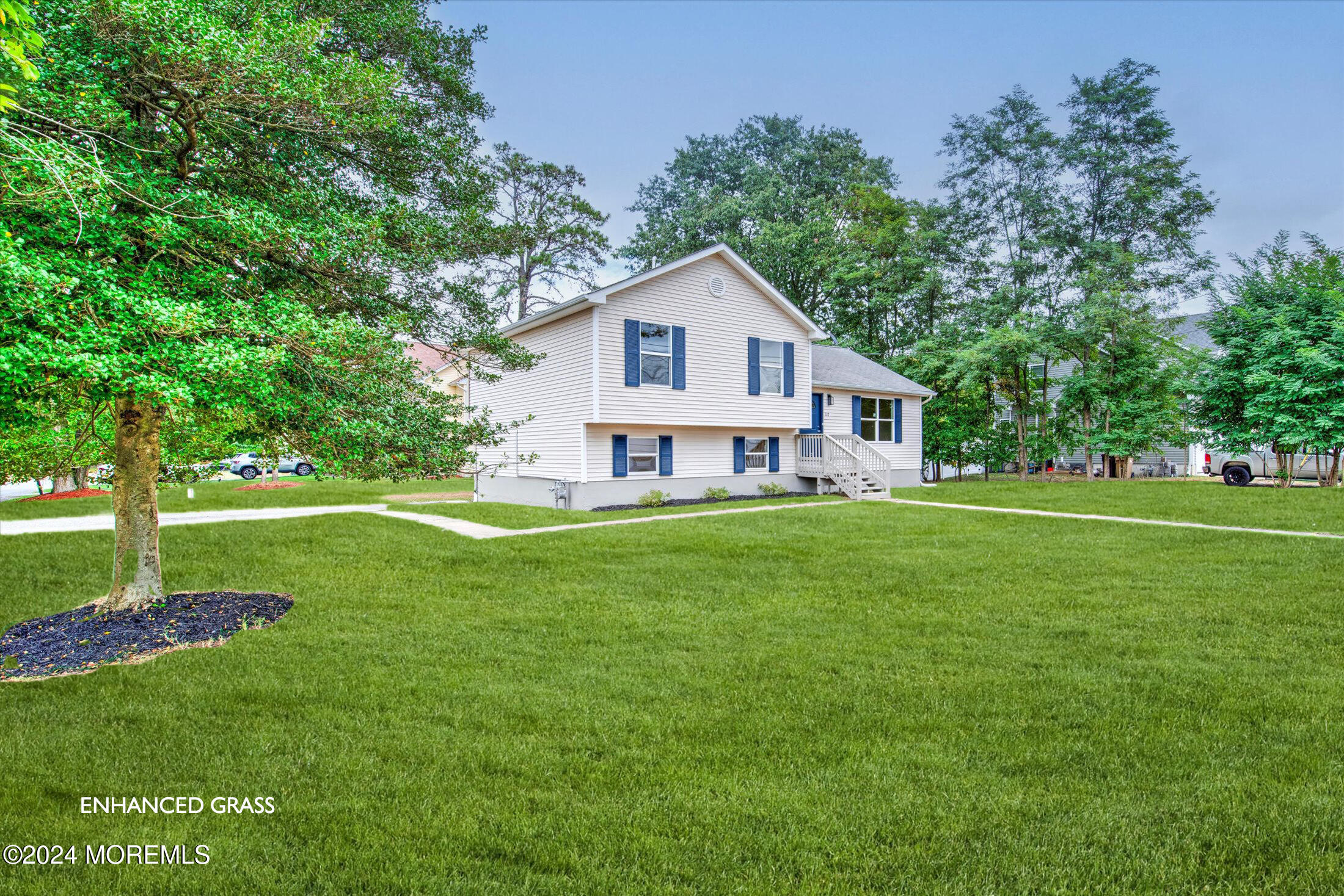 a view of a house with a big yard