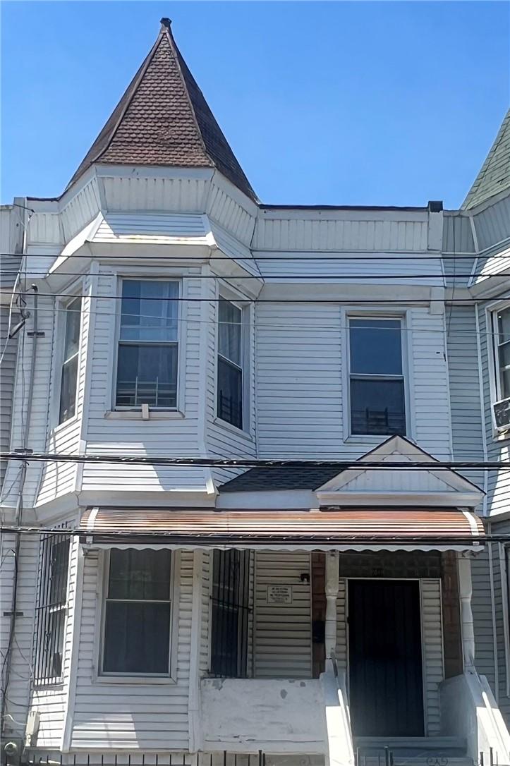 View of front facade featuring a porch