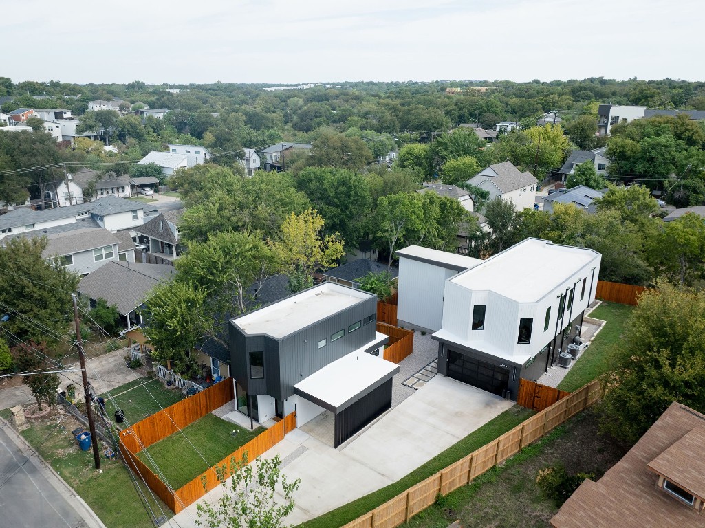 an aerial view of a house with a garden