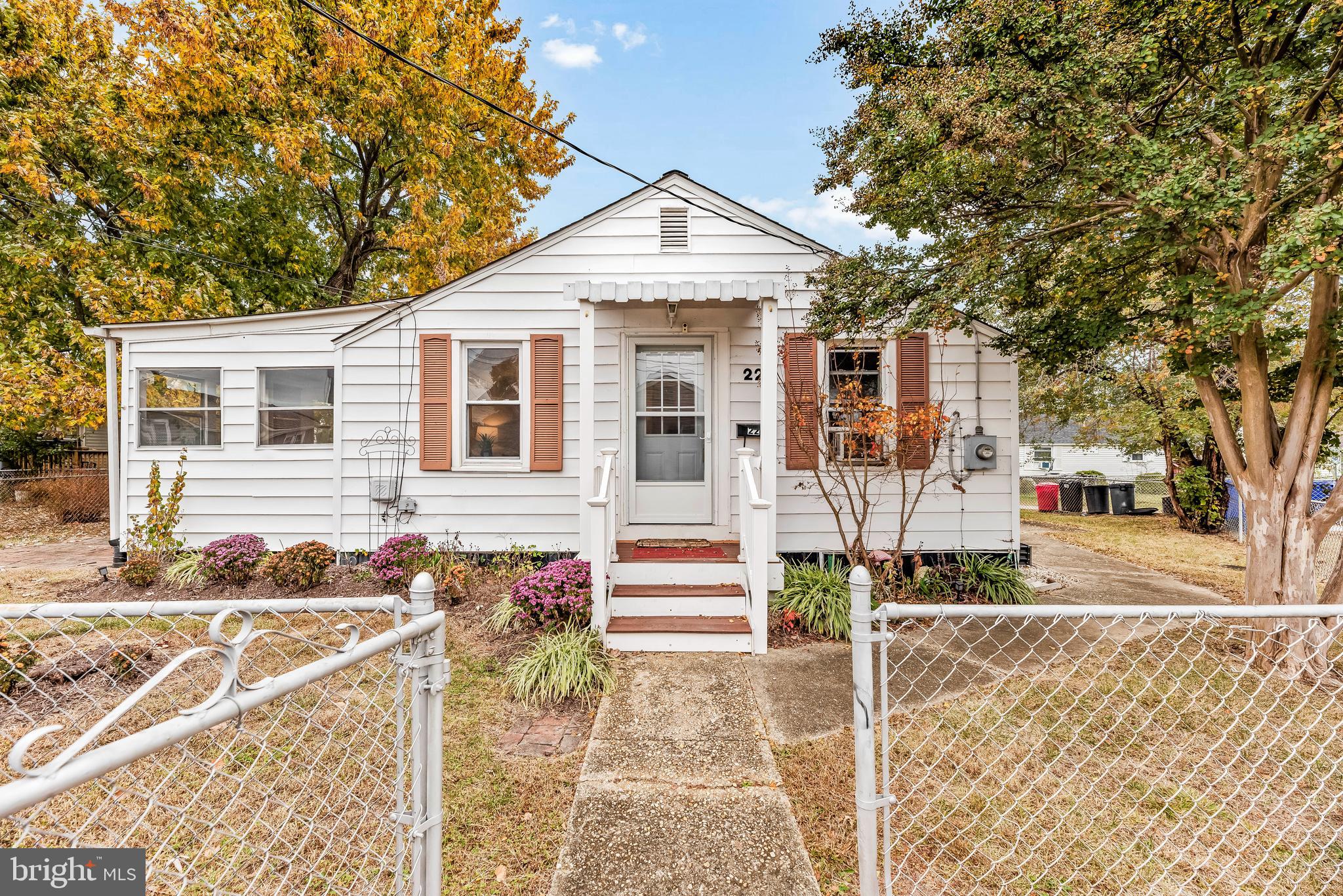 front view of a house with a small yard