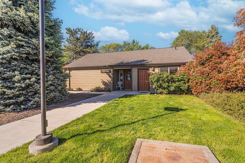 a view of house with backyard and garden