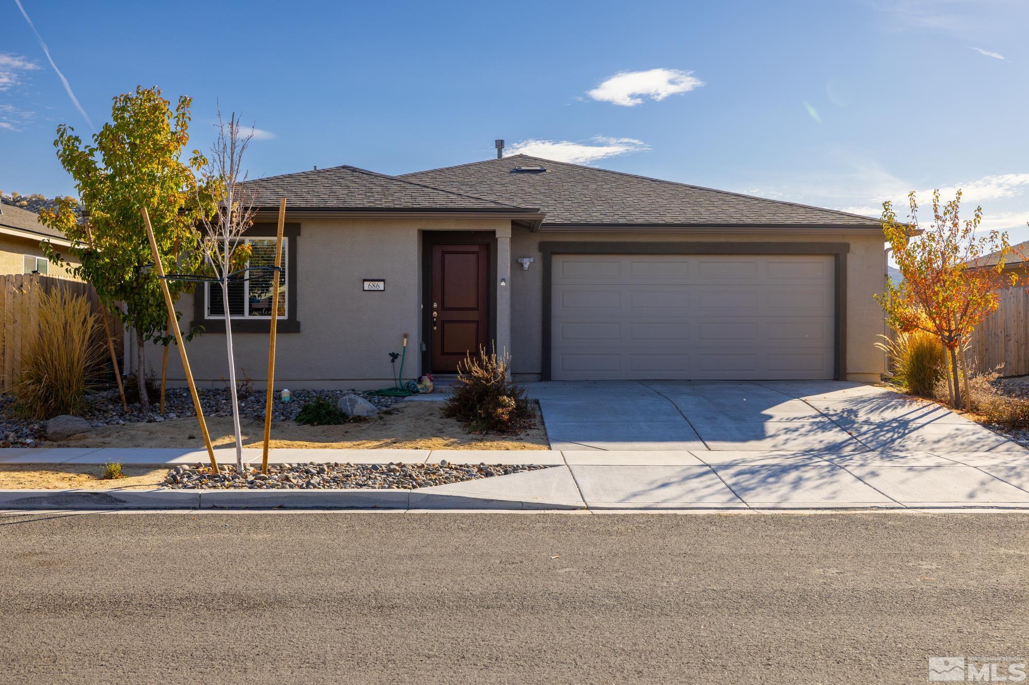 a view of a house with street