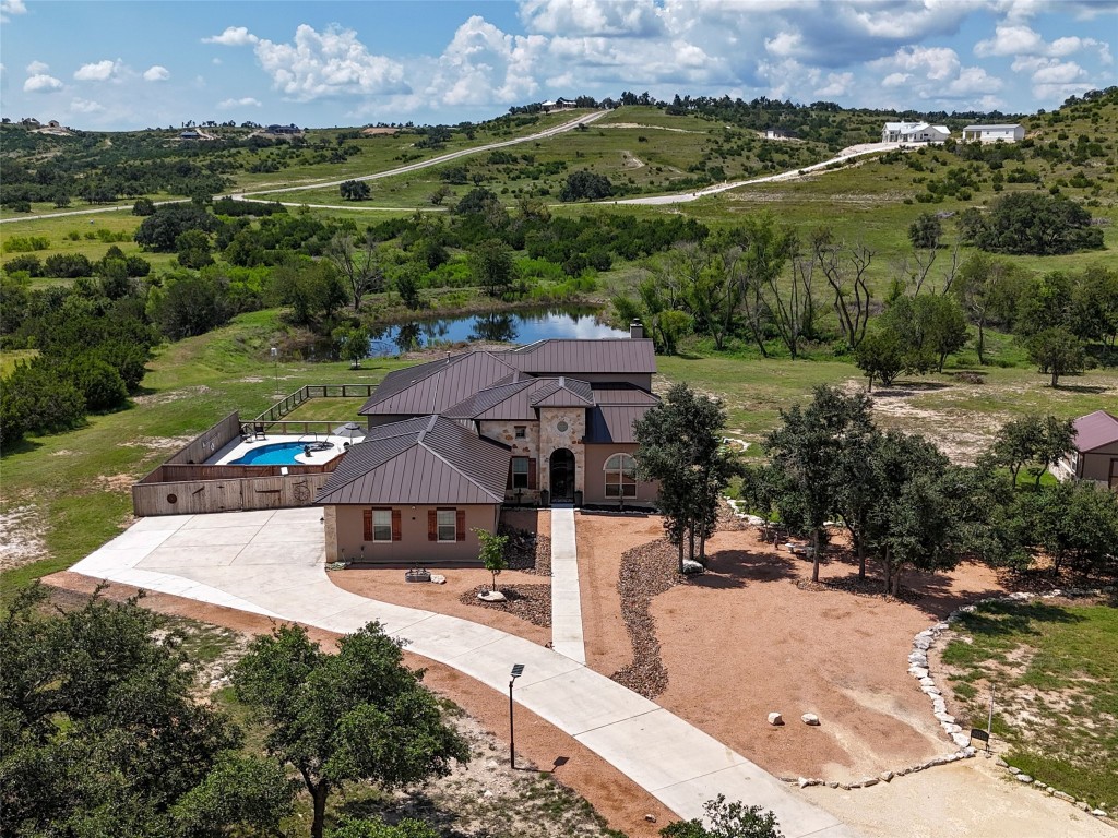 an aerial view of a house with a garden