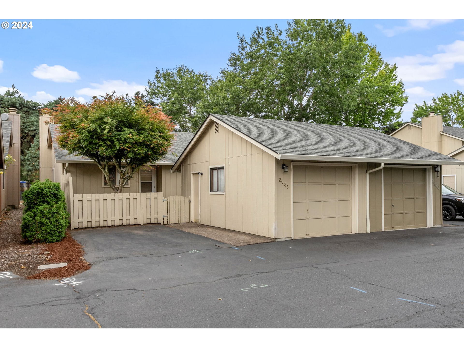 a view of a house with a garage