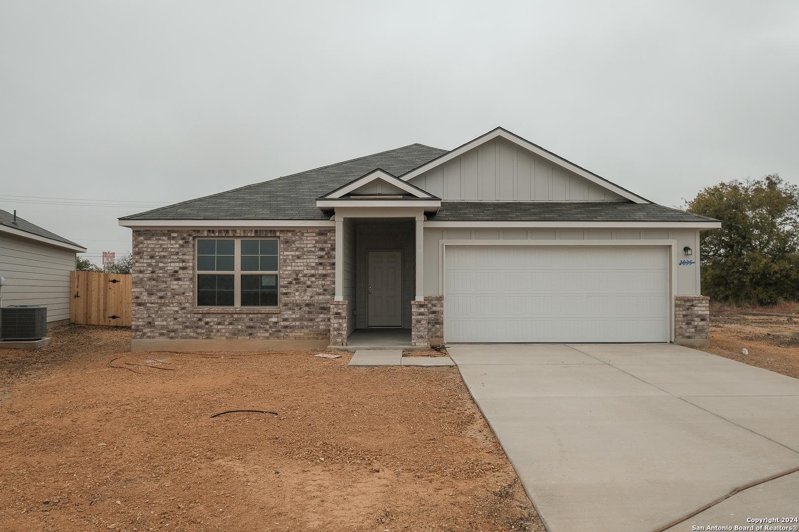 front view of a house with a garage