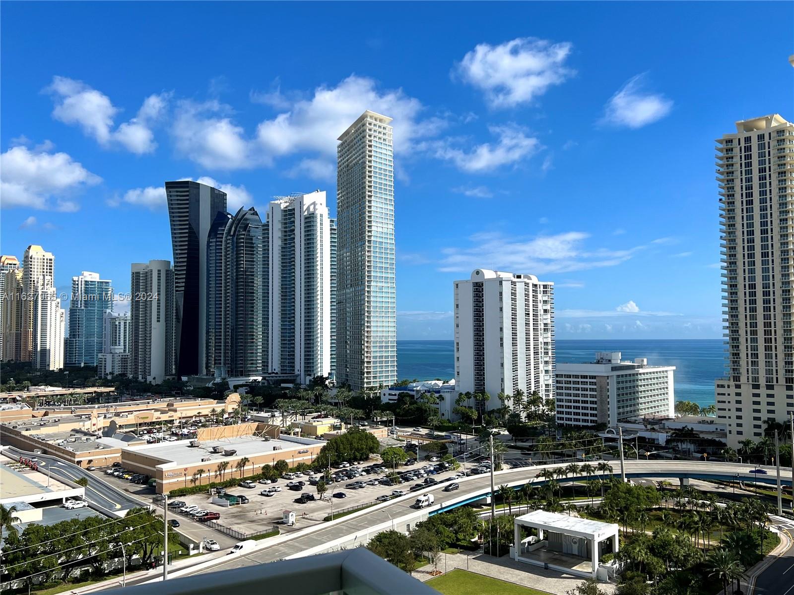 a view of a city with tall buildings