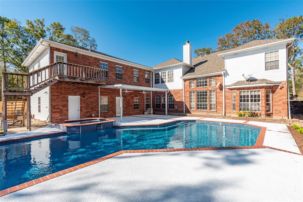 front view of a house with a swimming pool