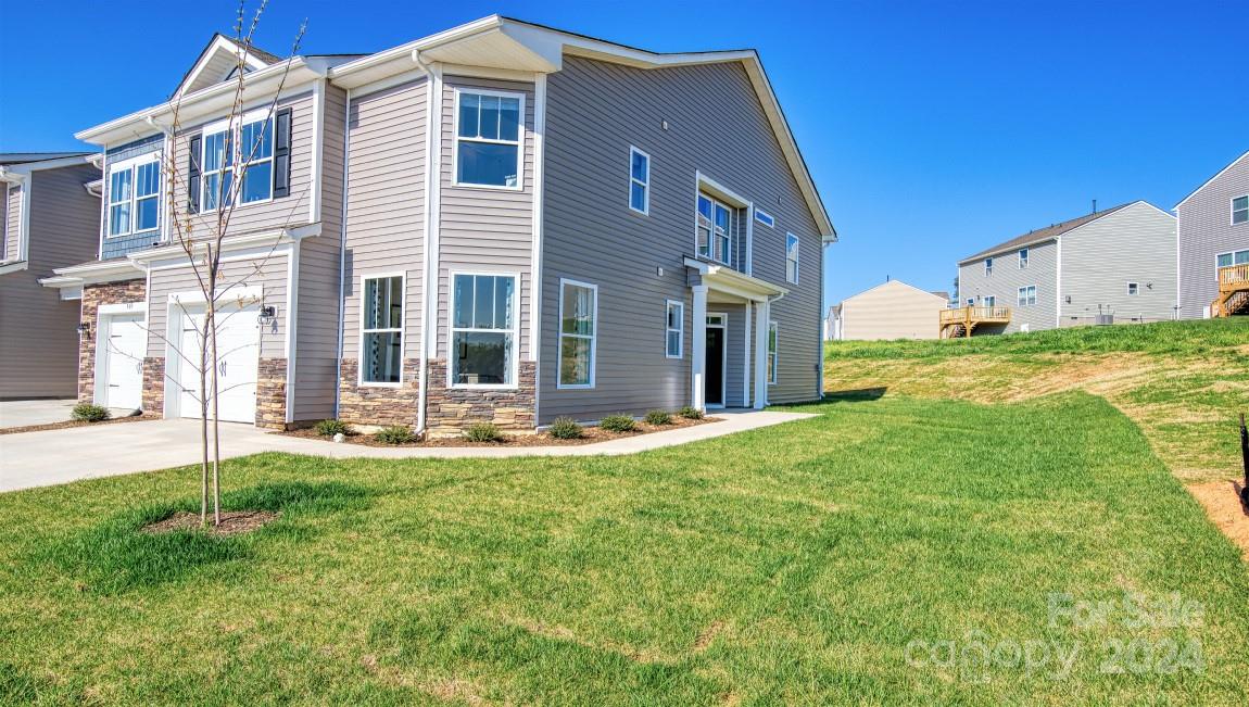 a front view of house with yard