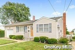 a view of a front of a house with a small yard