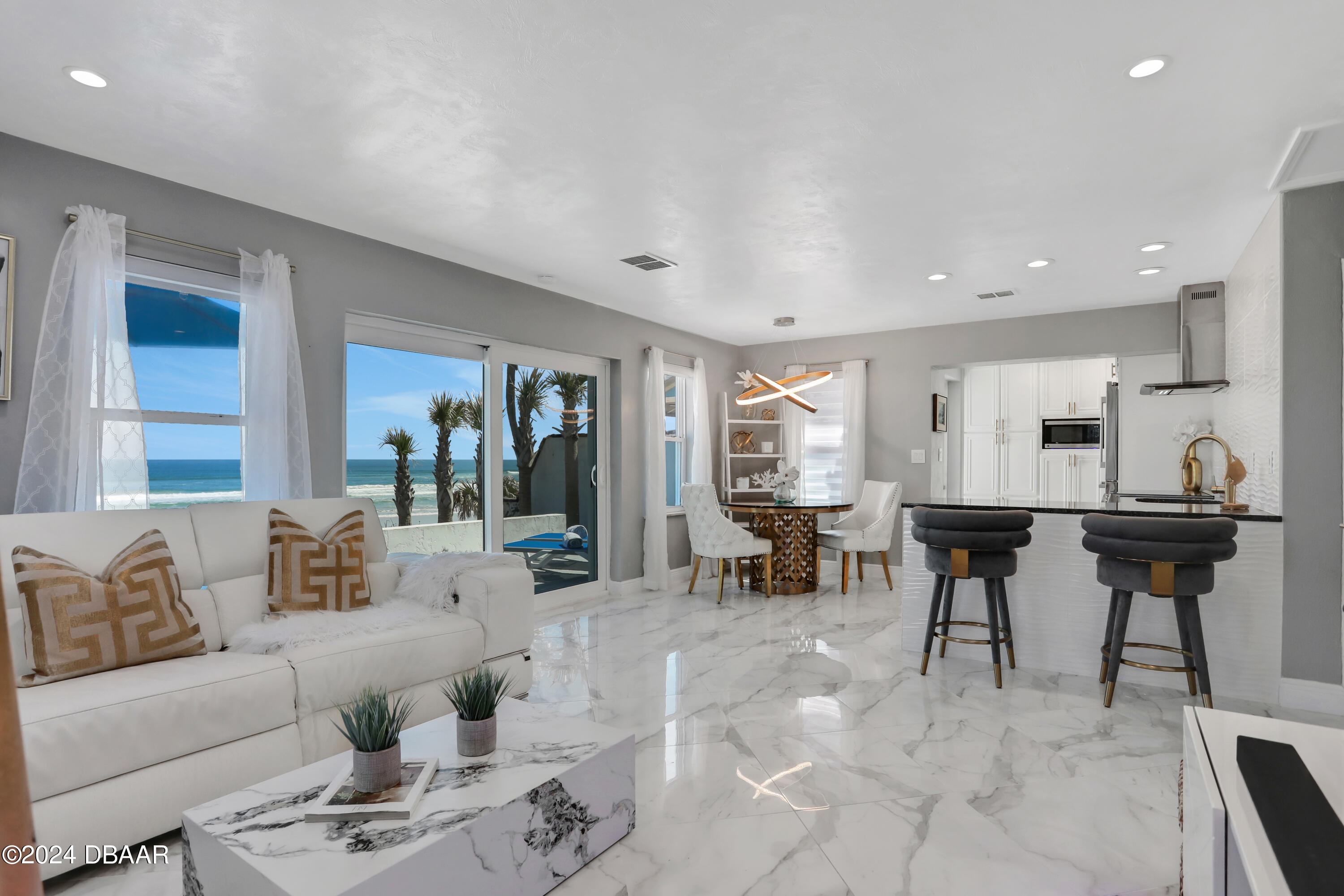 a living room with furniture and a table