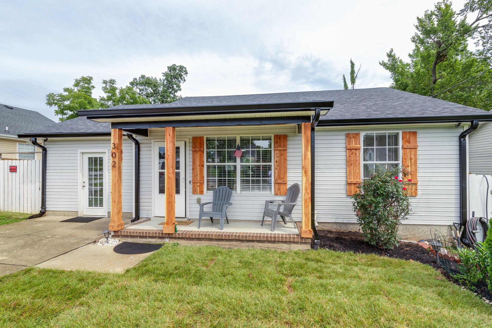 front view of a house with a yard