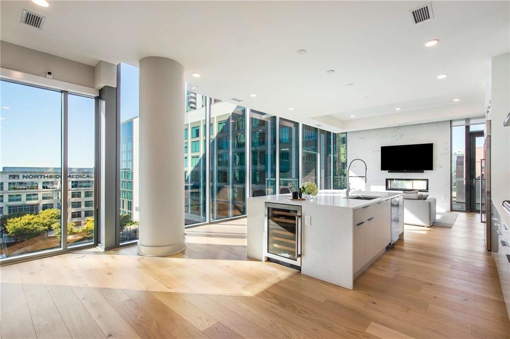 a view of living room with furniture and flat screen tv