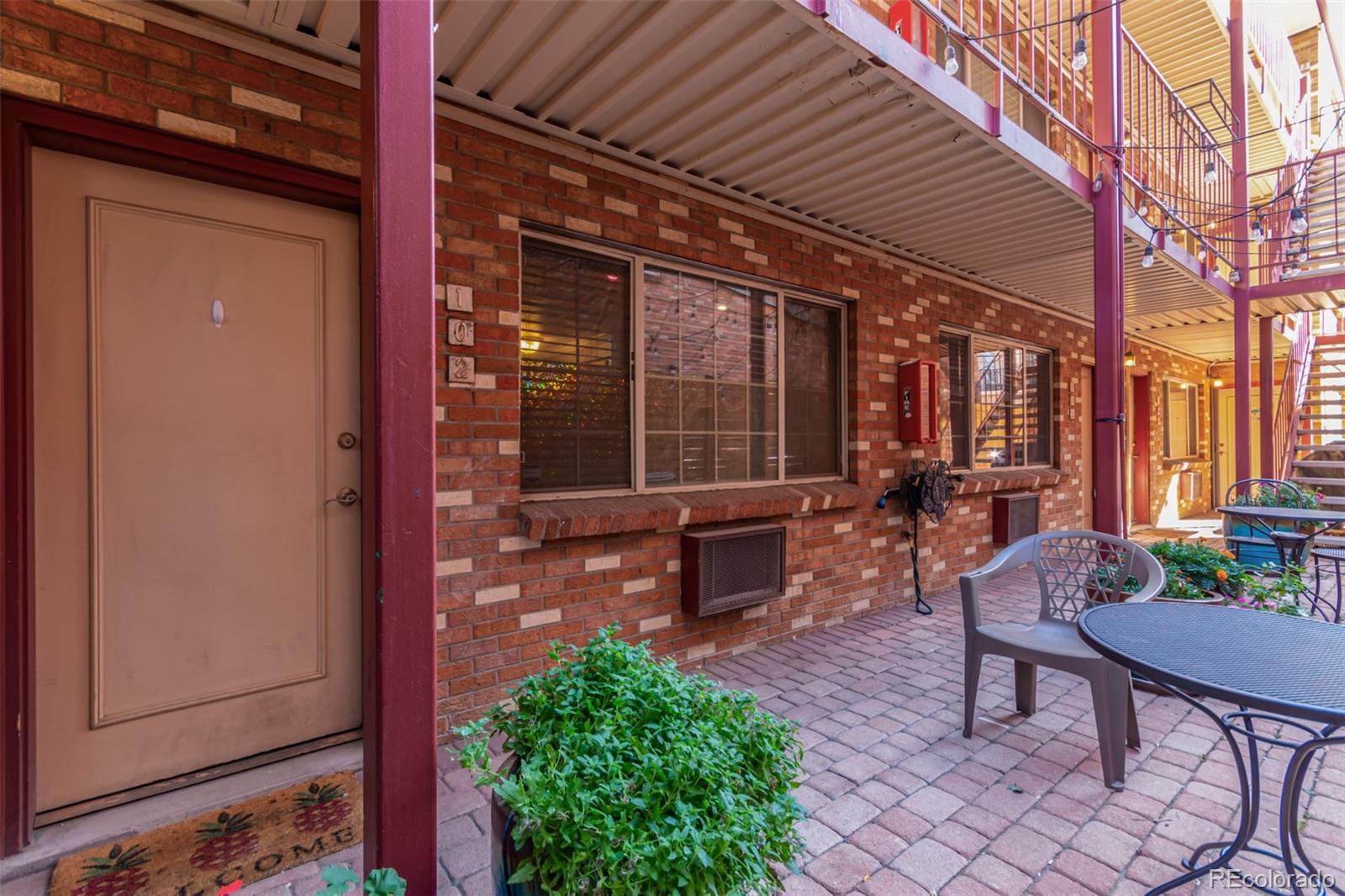 a view of a bench in the patio