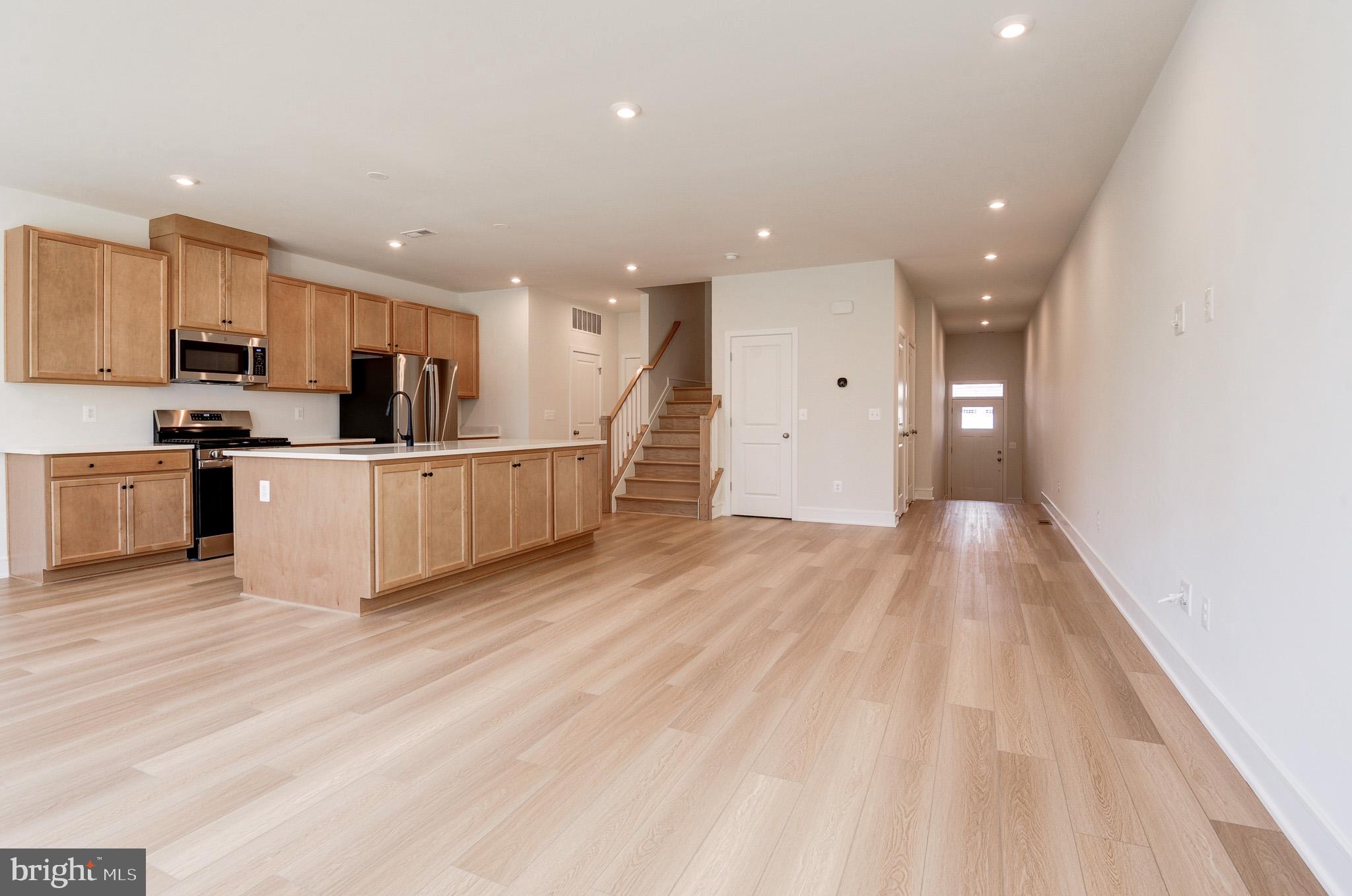 a view of a kitchen with a sink