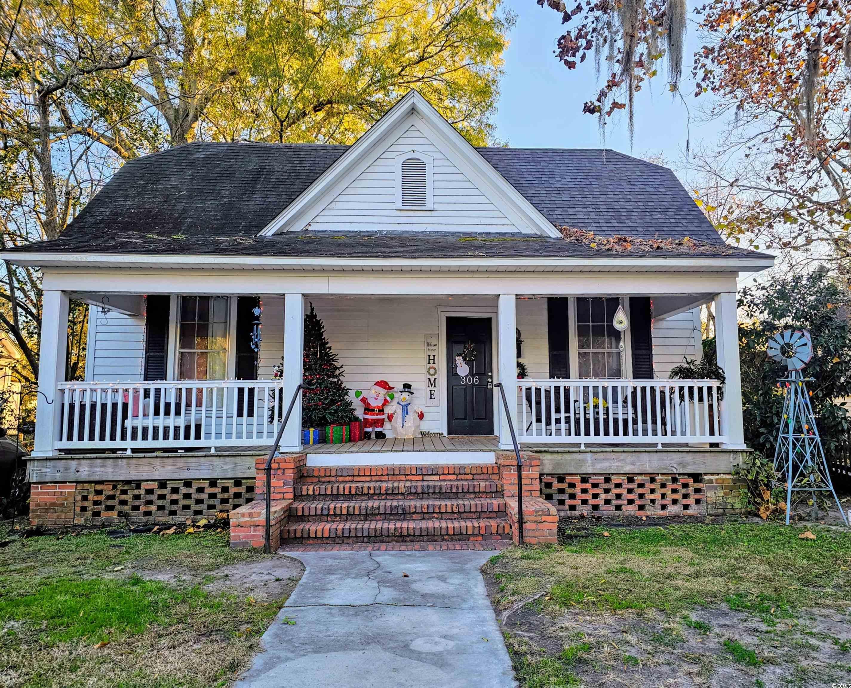 View of front of property featuring covered porch